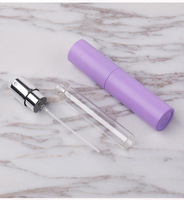 Atomiseur de parfum de luxe 10 ml en ABS, finition mate blanc, noir, rose, rouge, violet, jaune, vert, bleu, avec mécanisme rotatif, faible MOQ, en stock