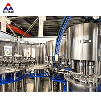 XINMAO Vente chaude Usine d'eau potable entièrement automatique 5000BPH 3 en 1 pour l'eau minérale pure