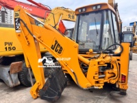 Chargeuse-pelleteuse JCB 4CX d'occasion, 4x4, roues égales, machine de terrassement robuste