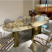 Hochwertiger Esstisch mit Edelstahlgestell in Ovaler Form Elegante Luxus-Designs Marmor-Esstische