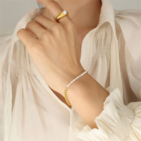 Bracelet pour femme CELES tendance en acier inoxydable plaqué platine avec perle d'eau douce en forme de boule
