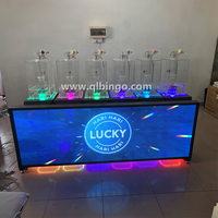 Machine de loterie personnalisée à écran haute définition 6D avec fonction RFID pour billets de bingo, idéale pour les tombolas en ligne