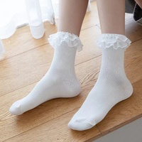 Chaussettes à volants mi-mollet en coton pour femmes avec motif de laitue à froufrous solide noir blanc Logo personnalisé Technique tricotée