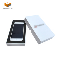 Boîte en carton kraft blanc produit en usine avec logo personnalisé emballage rigide vide pour téléphone portable universel de toutes tailles