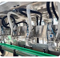 Système de remplissage automatique à 4 têtes avec suivi de ligne de production, machine de remplissage de liquide hydraulique pour huile moteur