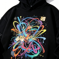 Sweat-shirt à capuche Raw Edge Kornit DTG avec imprimé graffiti vibrant, panneaux superposés, détails déchirés, coupe oversize, style streetwear
