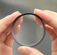 Filtre à lentille circulaire transparent anti-reflet UV OEM d'usine 55mm-82mm pour appareil photo reflex numérique avec cadre en aluminium et étanche