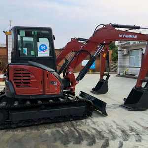 Excavatrice compacte sur chenilles en caoutchouc YANMAR VIO55 avec brise-roche, tarière, grappin et accessoires de travail - Product Image 2