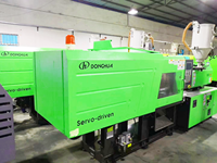 Machine de moulage par injection WELLTEC Donghua 130T Machine de fabrication de bouchons de bouteilles en plastique Machine de moulage par servomoteur