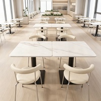 Mobilier de restauration minimaliste commercial, tables en pierre frittée sur mesure et chaises ergonomiques