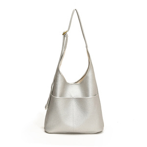 Sac à bandoulière simple et à la mode pour femme, sac à main décontracté et polyvalent de grande capacité, sac seau de couleur unie pour les trajets quotidiens - Product Image 1