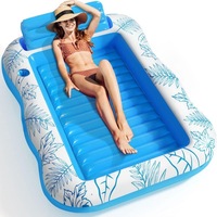 Matelas à eau gonflable personnalisé en PVC chaise longue bateau flottant grande plage bain de soleil salon d'eau flottant avec support à boissons