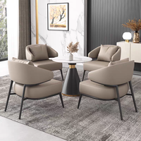 Ensemble de meubles de luxe moderne, fauteuil lounge en cuir PU orange, table ronde en pierre frittée, mobilier commercial pour hôtel