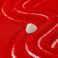 La Color Sand Factory vend du sable de couleur rouge foncé, idéal pour les cérémonies de fondation ou les célébrations d'ouverture.
