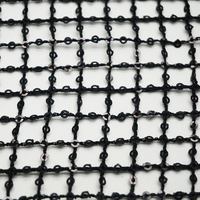 Tissu en dentelle de maille à sequins noirs brillants en polyester écologique et durable de Shaoxing, Chine, idéal pour les tenues de soirée et les vêtements féminins.