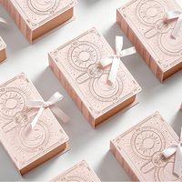 Boîte à dragées de mariage en forme de livre avec couvercle rabattable, ruban et nœud, étui d'emballage exquis pour souvenirs de cigarettes, logo personnalisé, fabricant en gros