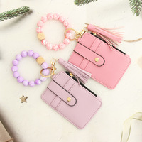 Dompet wanita kulit gelang manik-manik silikon kustom modis dengan tempat kartu ritsleting dompet koin gantungan kunci