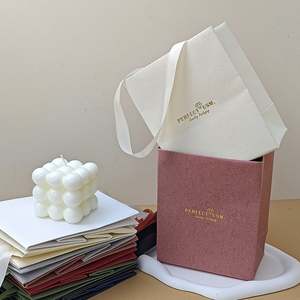 Hot Sale Luxury Paper <b>Shopping</b> <b>Bag</b> with Custom Logo Bow Tie Ribbon Promotional Candle Gift Printed on Coated Paper Lamination - Product Image 3