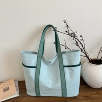Sac fourre-tout en toile épaisse à surface unie et design épuré pour l'école et les trajets quotidiens
