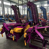 Moissonneuse-batteuse agricole automatique à chargement automatique pour arachide pomme de terre oignon carotte ail avec composants d'engrenage central