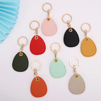 Porte-clés coeur personnalisé en cuir synthétique pour voiture Porte-clés en similicuir avec logo personnalisé pour promotion Porte-clés en cuir artificiel de qualité supérieure