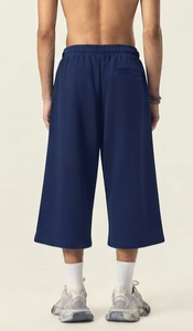 Shorts amples bleus unis pour hommes, taille mi-haute, avec cordon de serrage, style urbain décontracté, respirant, écologique, en toile infroissable - Product Image 3