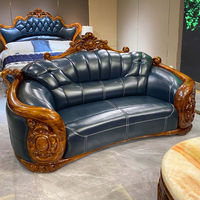 Canapé de luxe en bois massif de style européen moderne, avec revêtement en cuir de vachette pleine fleur noir et or, pour salon, villa, mobilier de maison