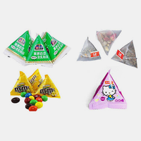 Emballage automatique Petit thermoscellé en forme de pyramide Triangle sac d'échantillon d'emballage en plastique pour chips Grain grains de café bonbons liquide