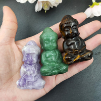 Usine en gros A0méthyste noir obsidienne oeil de tigre cristaux pierres précieuses naturelles cristal artisanat bébé bouddha Feng Shui gravure