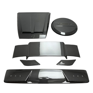 ชุดแต่งคาร์บอนไฟเบอร์แบบแห้งสไตล์ B สำหรับ Mercedes Benz G Class W464 G63 AMG G500 ปี 2019-2024 ฝากระโปรงหน้า สปอยเลอร์ ฝาครอบยางอะไหล่ - Product Image 1