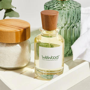 Botellas de perfume de vidrio cónicas exclusivas Tapas de tapa de corona de madera de Vietnam Embalaje de botella vacía única Cierres de botella de etiqueta privada - Product Image 1