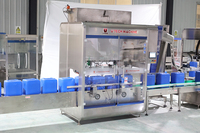 Machine de remplissage et de bouchage linéaire automatique pour bidons / fûts / seaux / barils en plastique de 5L 10L 20L 25L, bidon en PEHD de 20 litres