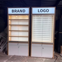 Vitrine d'exposition en bois pour accessoires électroniques commerciaux, présentoir de téléphones avec porte coulissante et éclairage LED