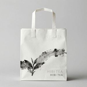 Bolsas de Papel Kraft Blancas Simples y Elegantes para Compras y Envoltura de Regalos con Asas Resistentes - Product Image 3