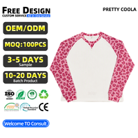 MT2307 Vente en gros de chemises thermiques à manches longues en tissu gaufré raglan, personnalisées avec un imprimé léopard rose et brodées, t-shirt décontracté à manches longues