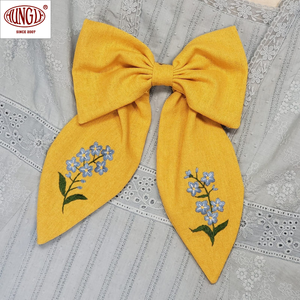 Produit en coton vintage avec style élégant de broderie à nœud jaune - Product Image 1