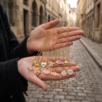 Collier pendentif F364 Boho Chic multi-motifs en émail, plaqué or, acier inoxydable, avec motifs œil, cœur et étoile, pour superposition
