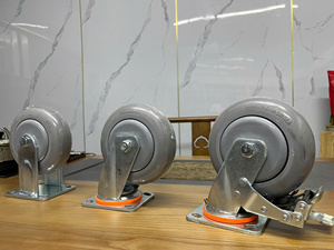 Rueda giratoria de caucho termoplástico gris de alta resistencia, con freno bloqueable, chapada en zinc, con protectores de rosca y placa de 5.5mm de espesor, amortiguadora. - Product Image 5