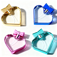 Flacons de parfum en verre transparent de luxe 50ml/100ml avec pompe en forme de cœur, vides, personnalisables avec logo et marque
