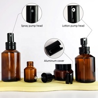 Épaule en pente ambre noir ensemble de soins de la peau bouteille de lotion contenants d'emballage de cosmétiques avec pot compte-gouttes noir avec couvercle