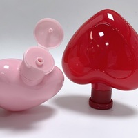 Bouteille en plastique imprimée PETG 300ml et 500ml en forme de coeur irrégulière avec pompe à lotion pour contenants d'emballage de shampooing