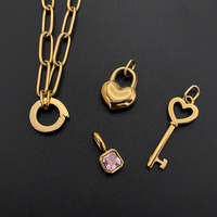Pulsera de Cadena de Acero Inoxidable Chapada en Oro de 14K para Mujer, con Cierre de Corazón, Llave y Circonita Rosa, Joyería Emanco