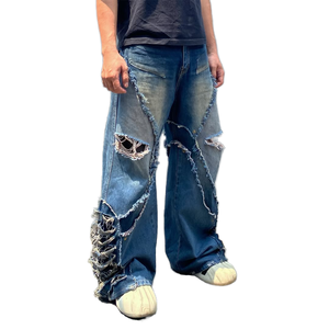 Pantalones vaqueros de mezclilla holgados con parches, estilo urbano, desgastados, con borde deshilachado, lavado vintage, de pierna ancha, oversize, con patchwork y ajuste holgado. - Product Image 1