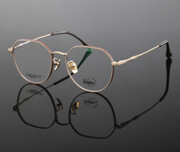 Plaque unisexe faite à la main, cadre rond rétro en titane, monture de lunettes optiques, vente en gros, montures optiques en titane pur