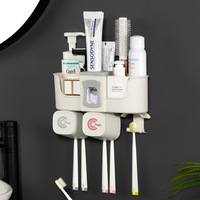 Porte-brosse à dents mural de salle de bain, 4 tasses, porte-distributeurs de dentifrice sans perforation, porte-coins de salle de bain