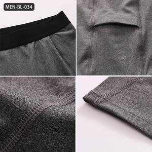 Short d'entraînement de compression pour homme avec poches-Short de course et d'entraînement à séchage rapide évacuant l'humidité avec tissu extensible - Product Image 5