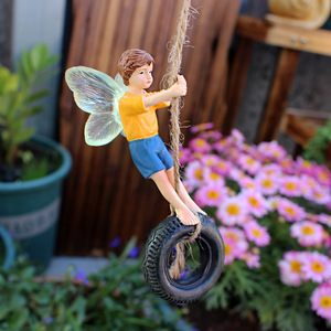 OEM ODM Décorations de scène créatives pour <span class=keywords><strong>jardin</strong></span> féerique miniature, en forme de pneu et d'ange, sculptées et polies - Product Image 1