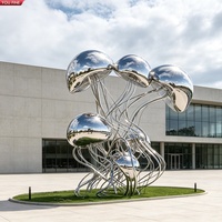 Sculpture de Quatre Dauphins Entrelacés en Acier Inoxydable Poli Miroir YOUFINE avec Boule Dorée sur le Haut, Statue pour Espace Public