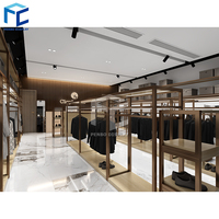 Étagère de présentation de vêtements en métal pour magasin de vêtements, décoration de boutique, présentoir de vêtements brillant doré
