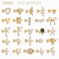 Anting-anting tusuk emas 14K HGC model princess cut, berulir dalam, dengan berbagai desain kristal/berlian imitasi, rantai, dan anting hidung.